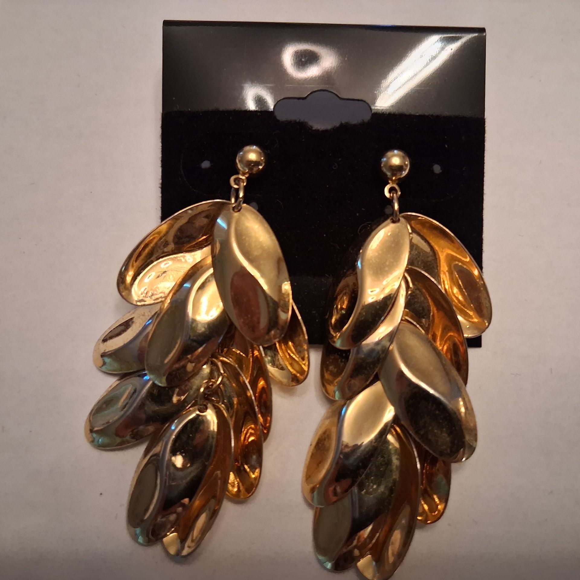 post gold tone earrings cascading leaves