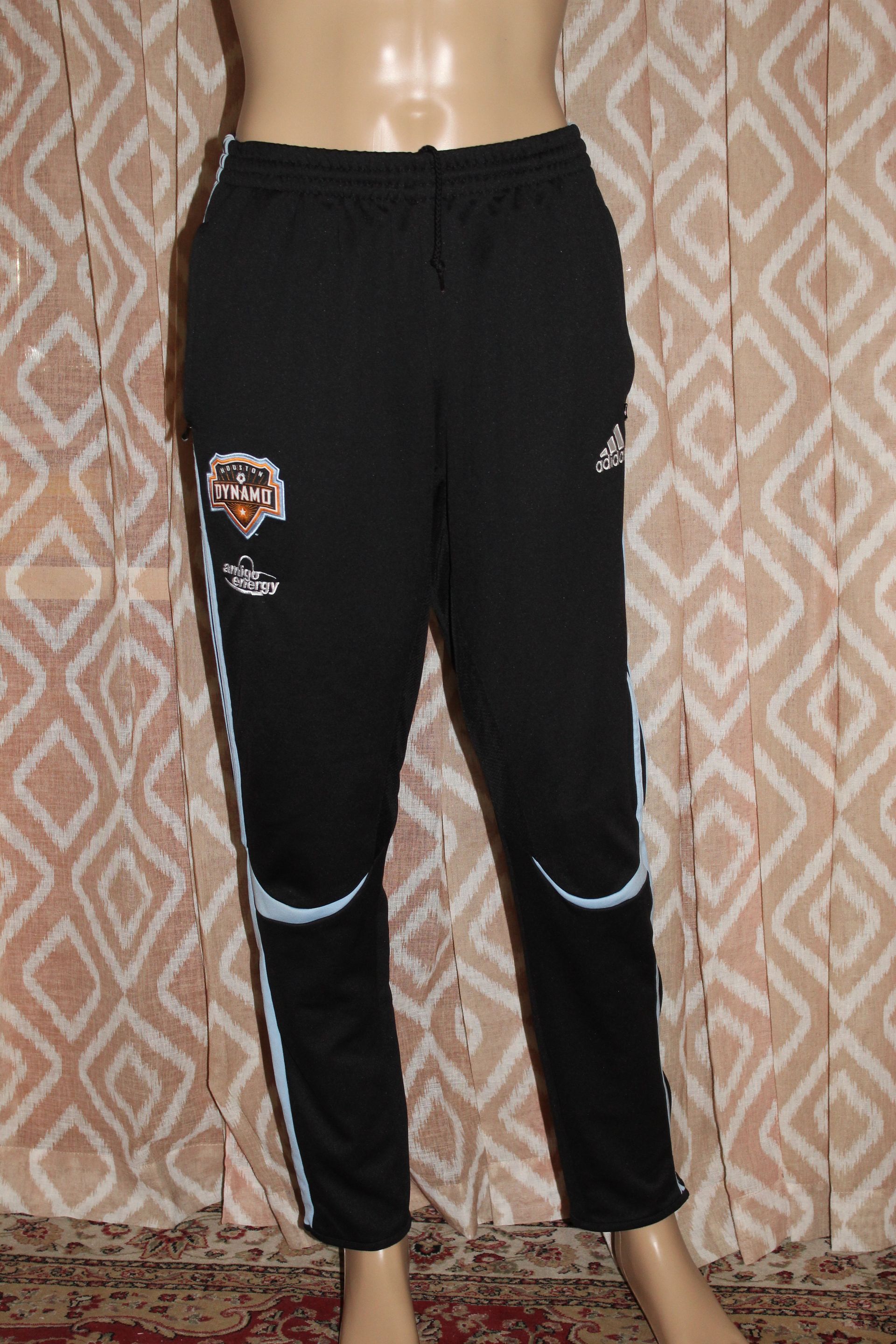 Black jersey with FC Dynamo crest and white side stripes on the chest