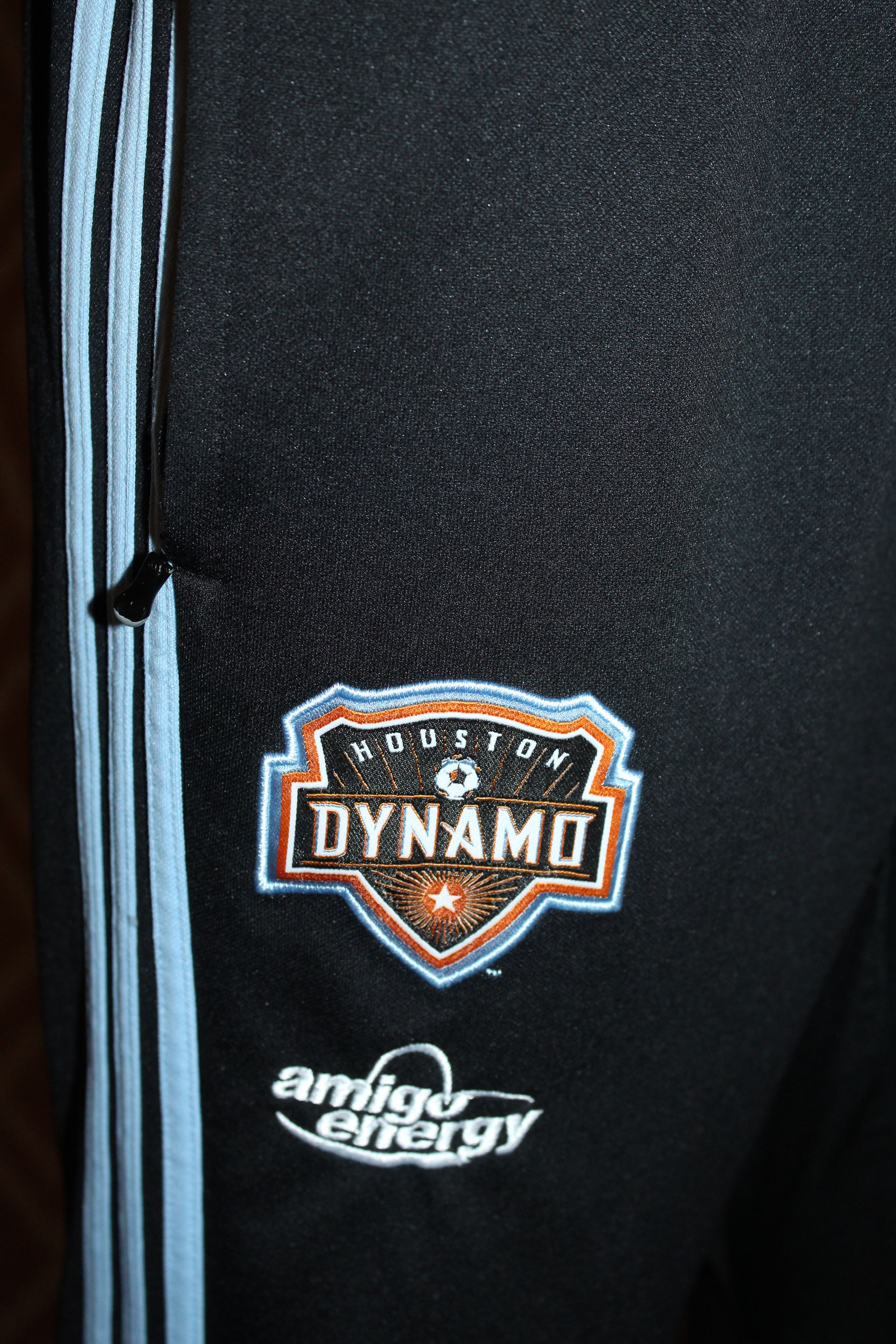 Black jersey with FC Dynamo crest and white side stripes on the chest