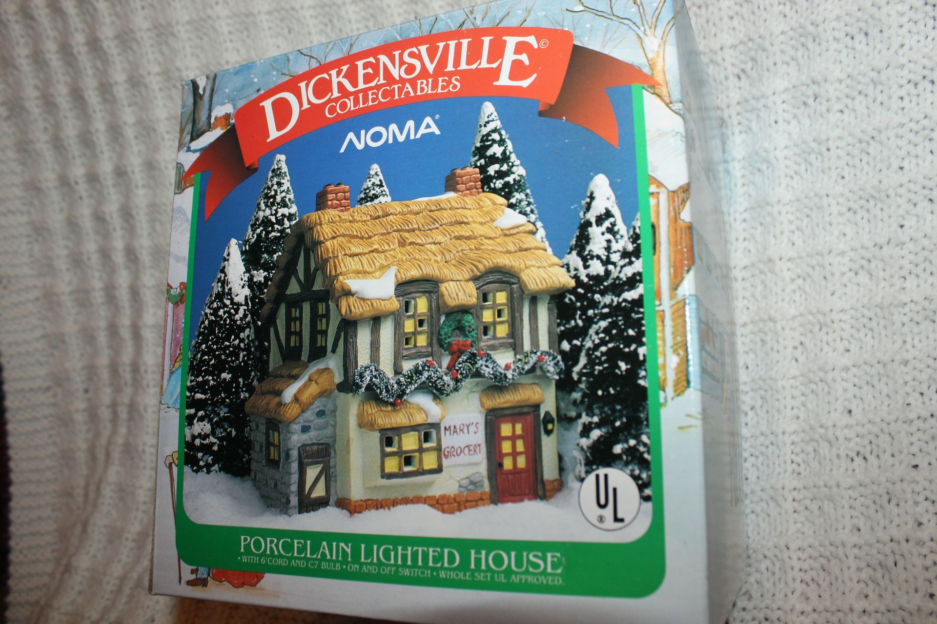 Dickensville Collectibles Noma lit house box with snowy cottage illustration