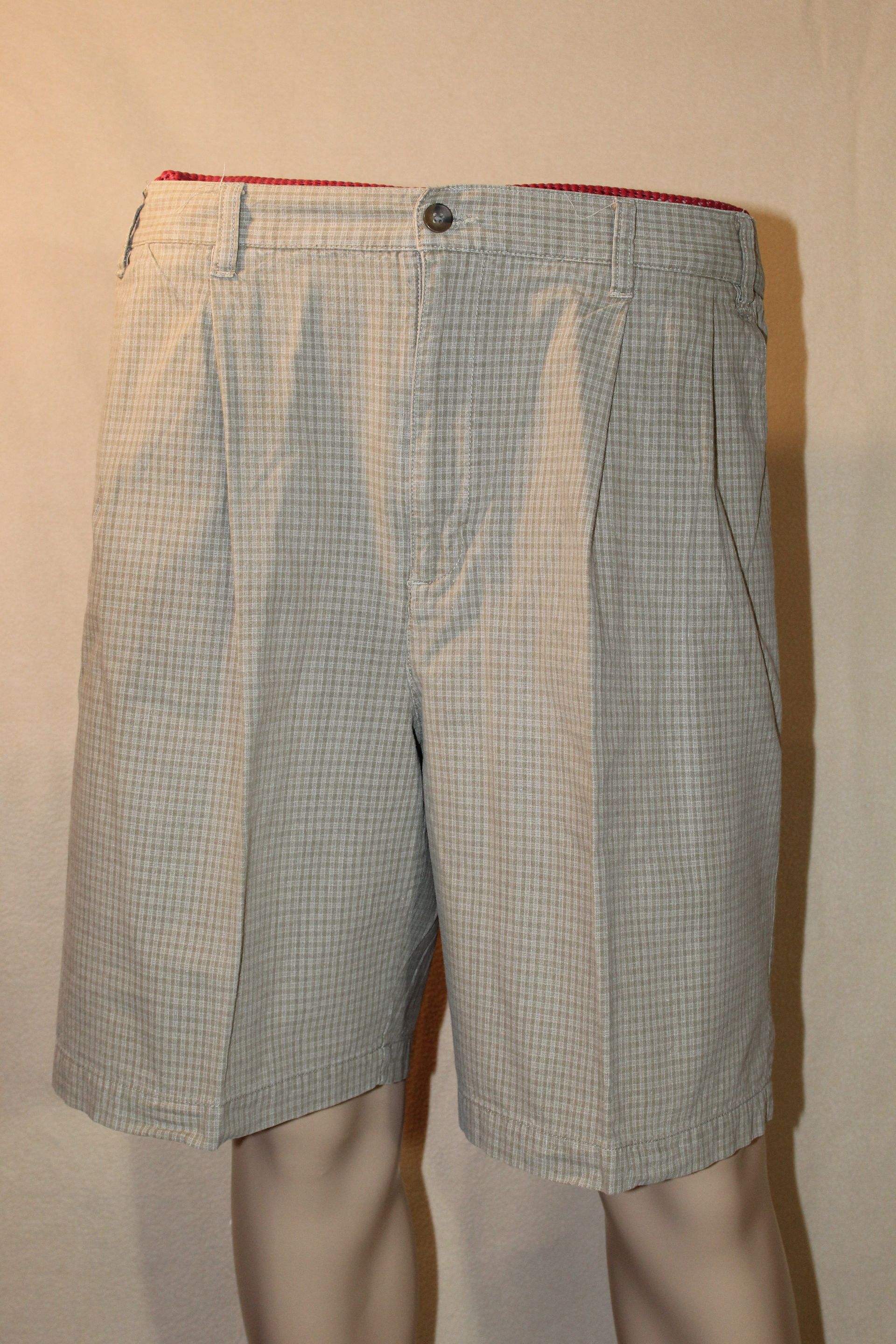 Light blue patterned shorts with a red waistband on a mannequin's lower body