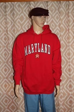 Mannequin wearing a red Maryland hoodie and blue pants against a patterned curtain backdrop