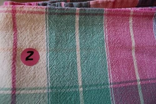 Pink and green plaid fabric with a small pink circle labeled “2”