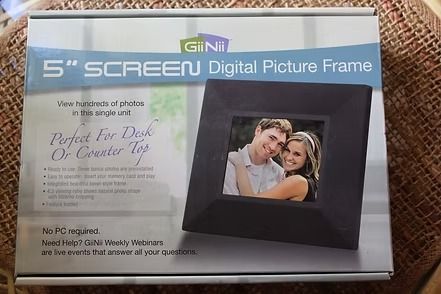 Box for a 5-inch digital picture frame with a family photo on the front