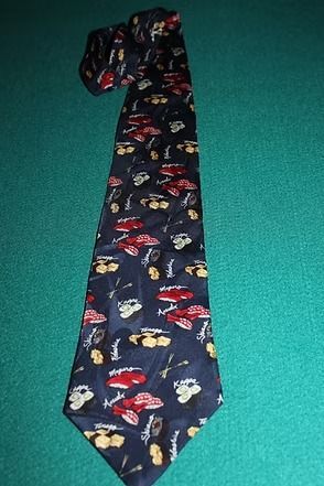 Dark navy necktie with colorful cartoon cars and faces on a teal background