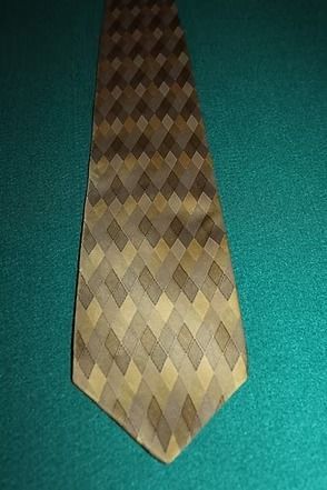 Brown patterned necktie on a teal background