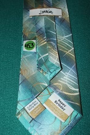 A blue-green striped necktie on a teal textured background.