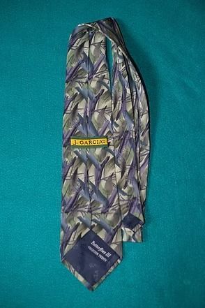 Patterned necktie on a teal background