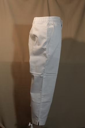 White pants shown in side view against a plain brown background.