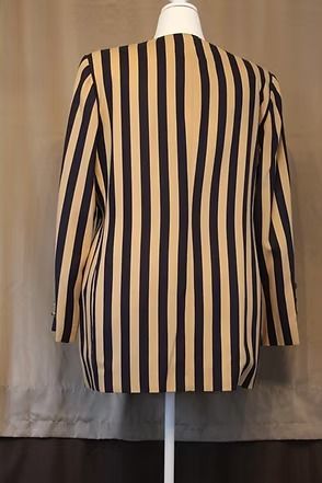 Black-and-beige striped long-sleeve jacket on a mannequin against a neutral backdrop