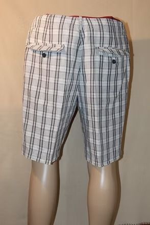Plaid knee-length shorts displayed on a mannequin, with pockets and belt loops