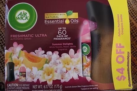 Air Wick Essential Mist refill with black diffuser, purple and yellow packaging, $4 off coupon