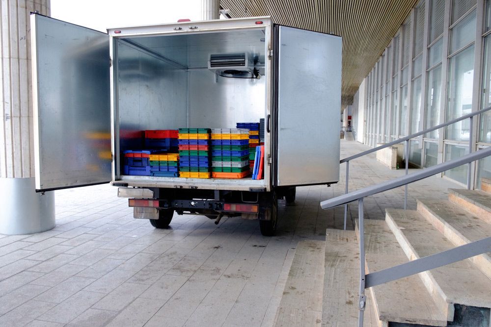 A Row of Boxes Stacked on Top of Each Other in a Storage Truck — Central Coast Storage Solutions in West Gosford, NSW