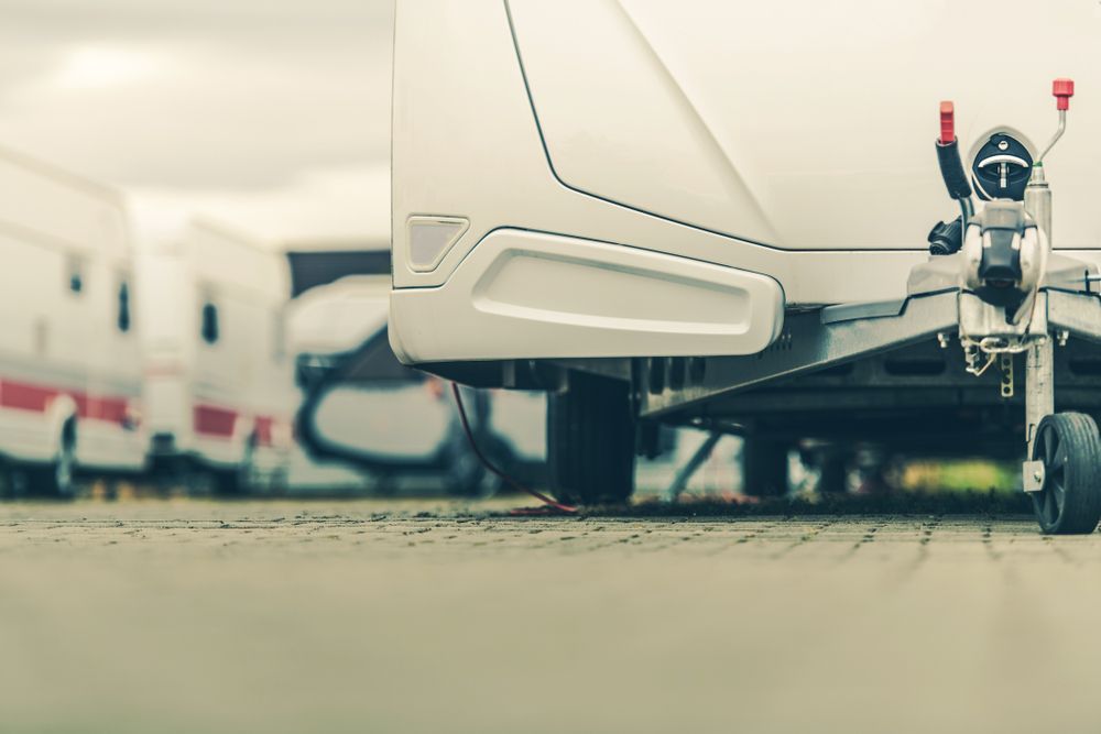 A Camper Trailer is Parked on the Side of the Road — Central Coast Storage Solutions in West Gosford, NSW
