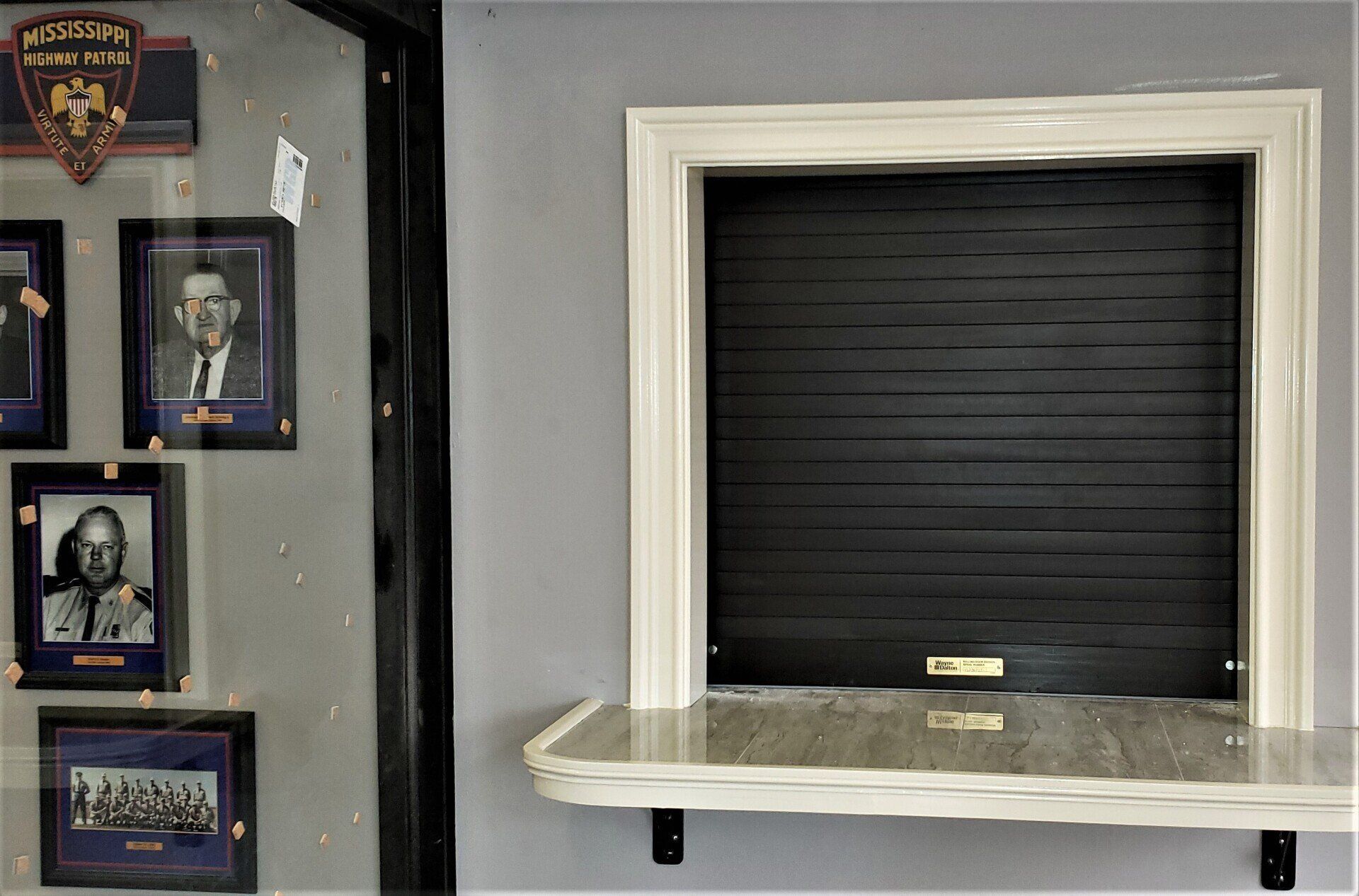 A display case with pictures of police officers on it