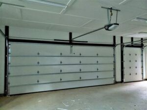 A garage with a lot of doors and a garage door opener