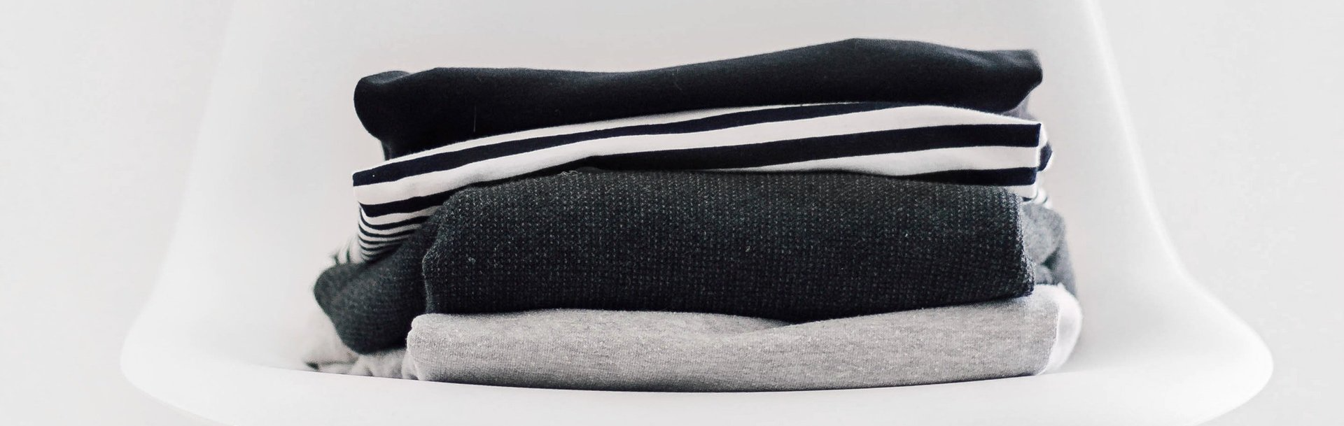 Clothes Folded on a Chair
