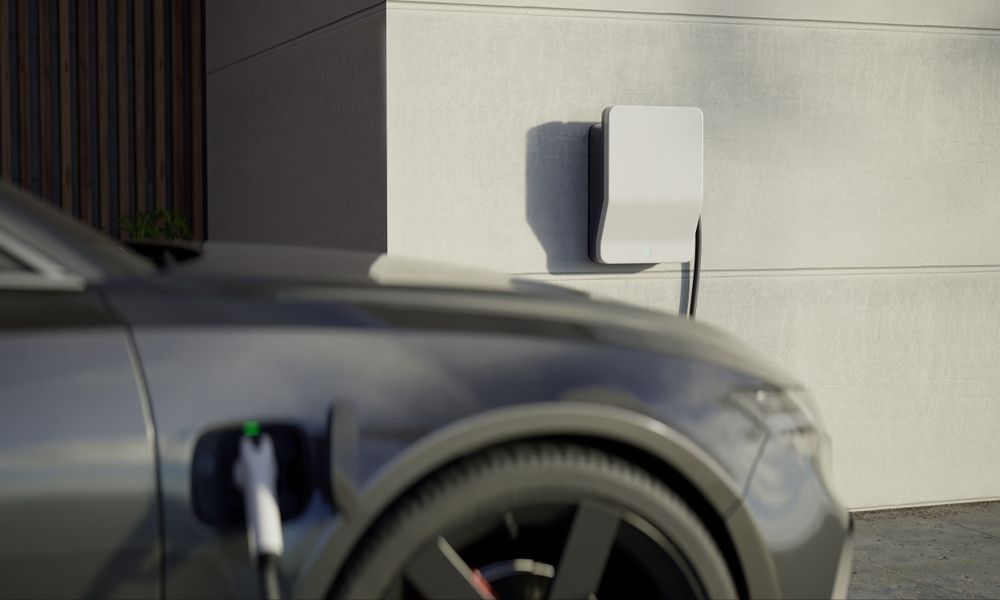 An Electric Car Is Being Charged At A Charging Station — RAFFBRO Electrical Solar & Air Conditioning In Wodonga, VIC