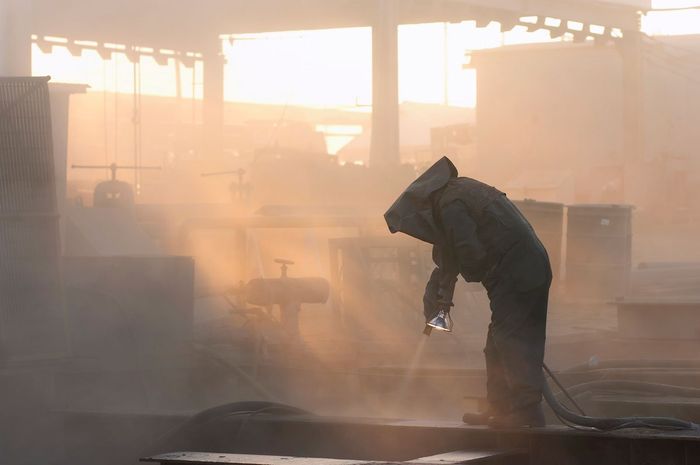 Worker Sandblasting — LaVergne, TN — Acme Sandblasting Worker Sandblasting — LaVergne, TN — Acme Sandblasting
