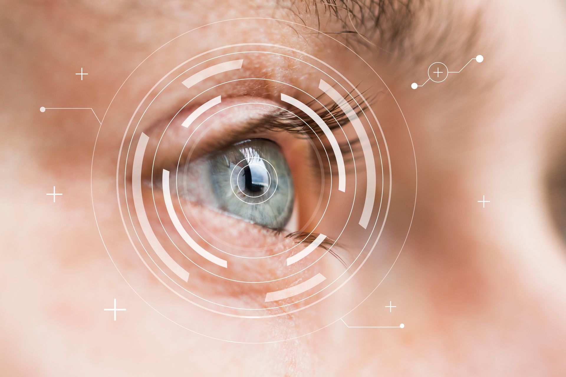 Close-up of a human eye with a digital scanning interface overlay
