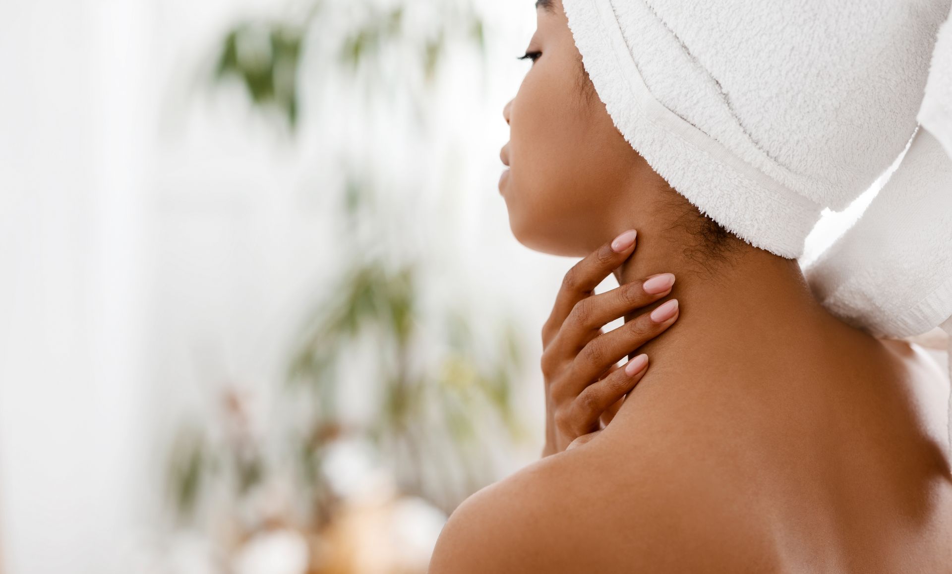 Woman with towel on head.