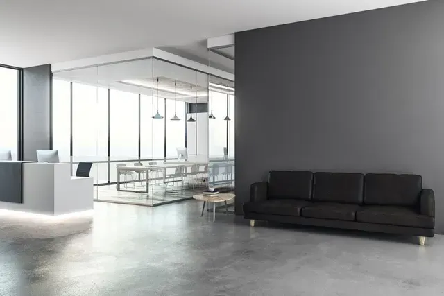 Grey Walls, Black Sofa, White Reception Desk, Glass-walled Conference Room — George Pappas Painting In Buderim, QLD