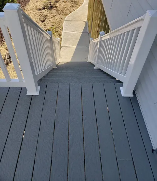 Grey Deck With White Railing Leads to Concrete Path — George Pappas Painting In Buderim, QLD