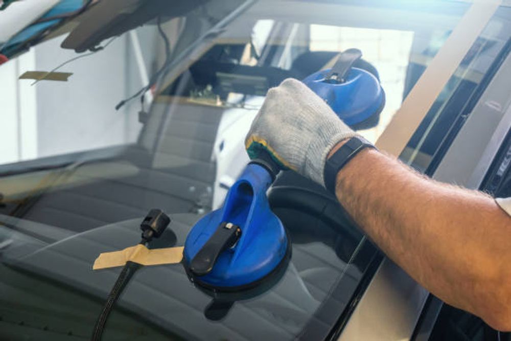 Placing the New Windshield in the Car - Redlands, CA - Alpha Auto Glass