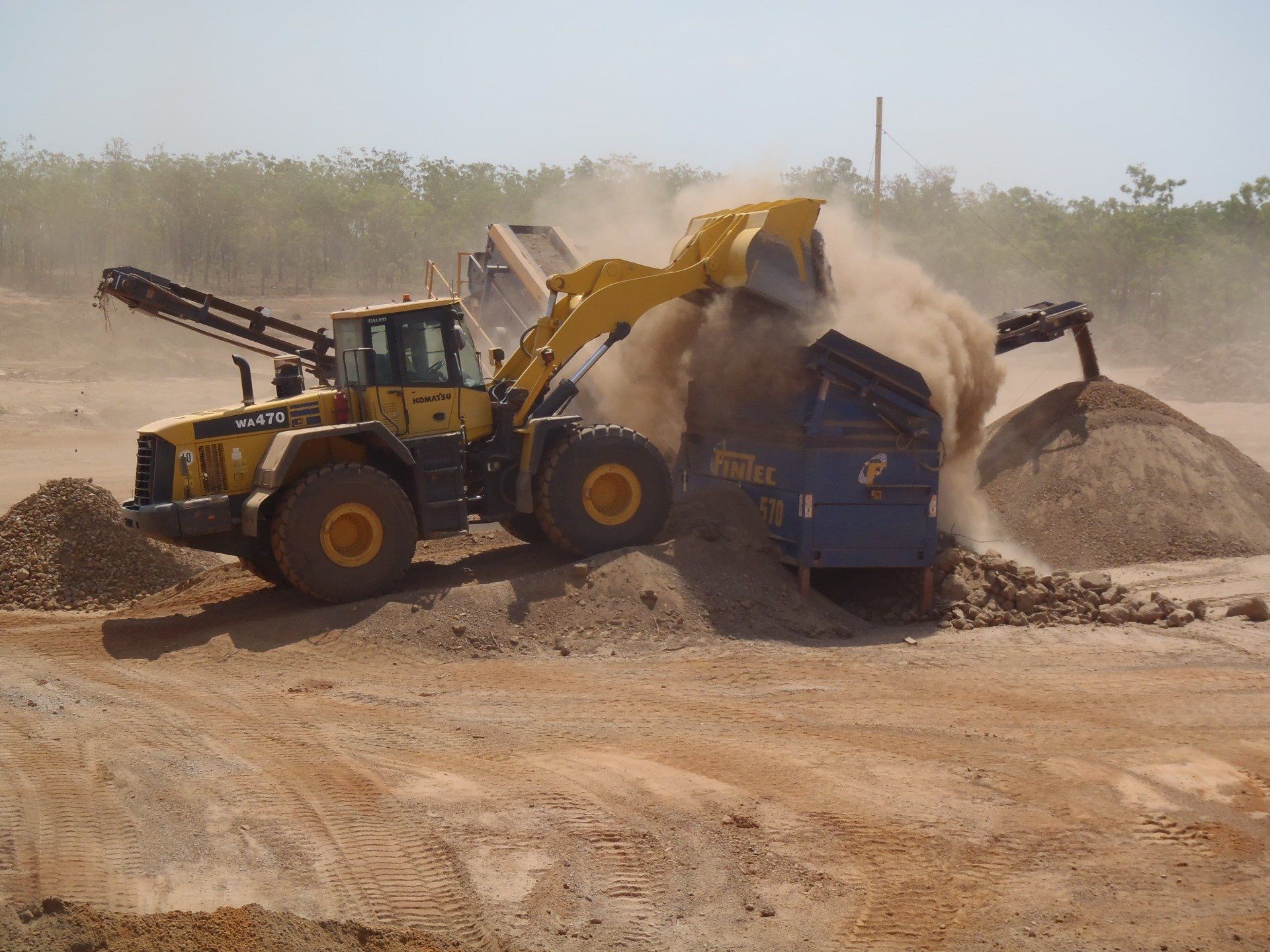 Earthmover Dumping Dirt - Lavercombe Quarries