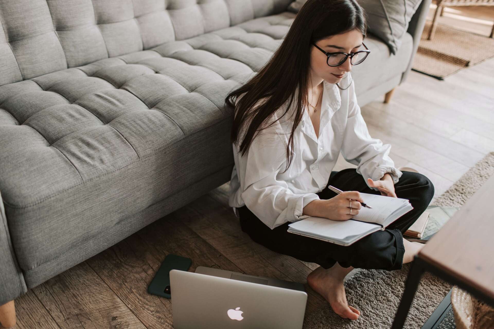 virtual celebration of life woman writing a grief journal