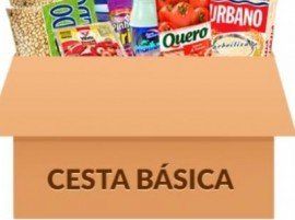 Uma caixa de papelão cheia de uma variedade de itens alimentares.