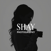 Silhouette of a photographer holding a camera, with “SHAY PHOTOGRAPHY” text overlay.