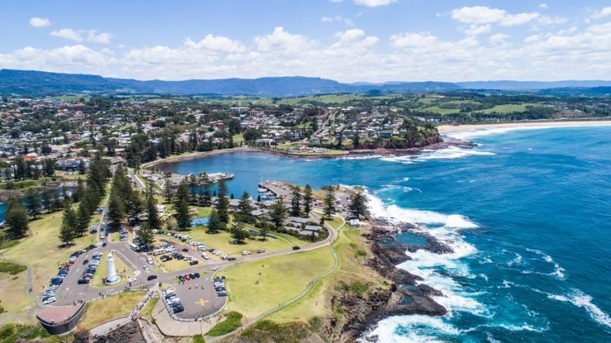 An Aerial View of a City Next to a Body of Water — Bonanno's Menswear in Kiama, NSW