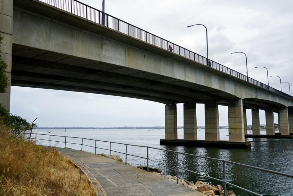 A Bridge Over a Body of Water With a Railing — Bonanno's Menswear in Sutherland, NSW
