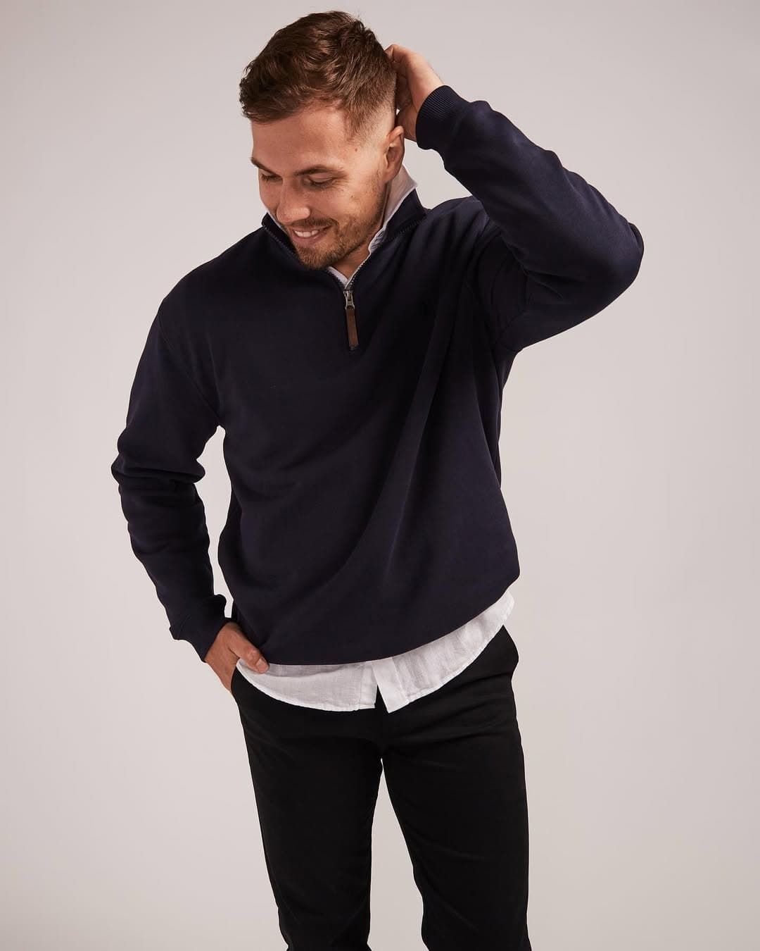 A Man is Wearing a Blue Sweater and Black Pants — Bonanno's Menswear in Engadine, NSW