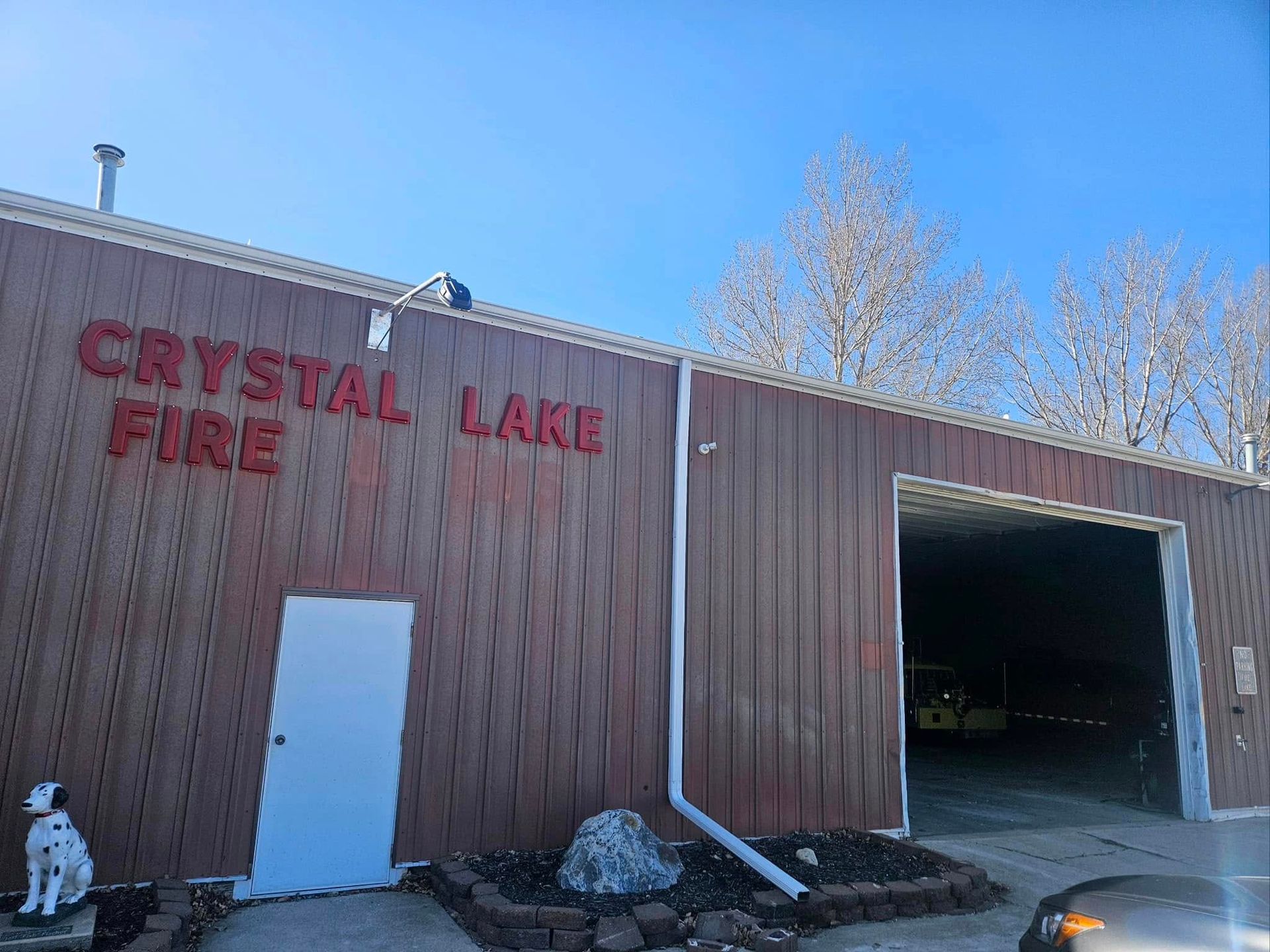 A brown building with the sign