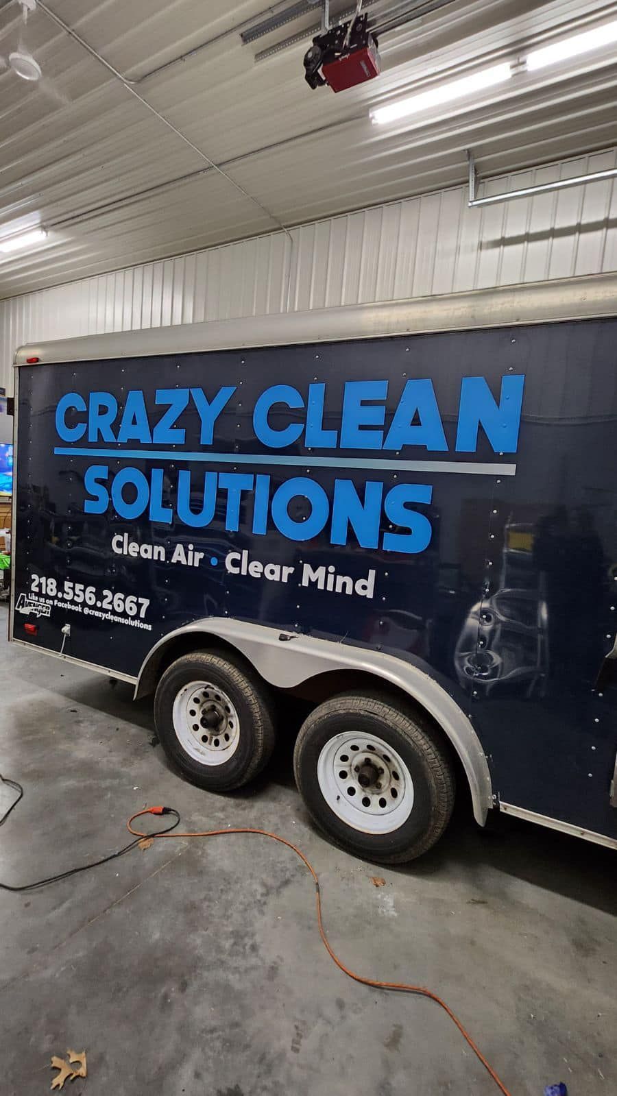 Dark blue service trailer with