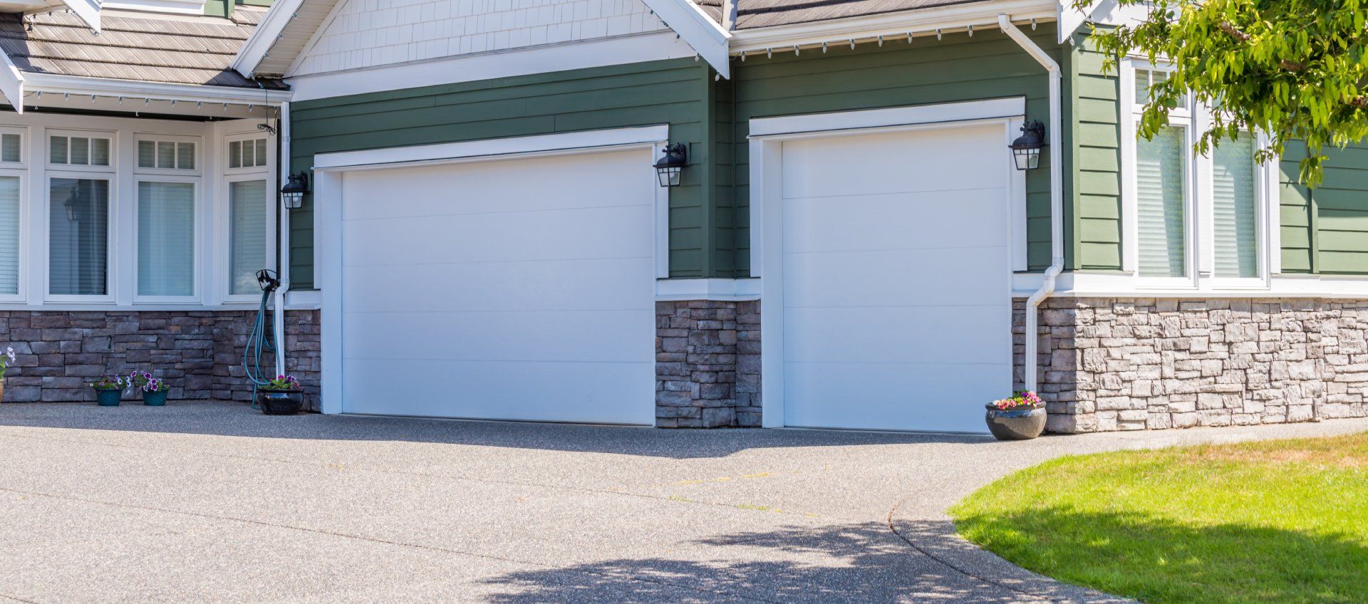 Sleek modern garage door boosting curb appeal and home value, professionally installed by Tri-Lakes Garage Doors in Denver.
