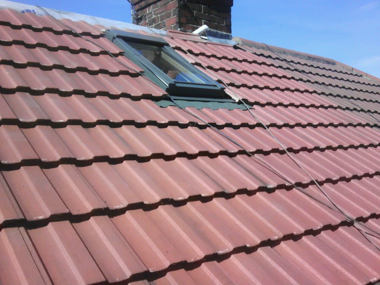 A picture of a new roof installed by Roofers Manchester
