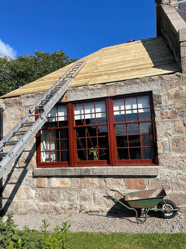Roofers Manchester - pitched roof replacement on a stone extension