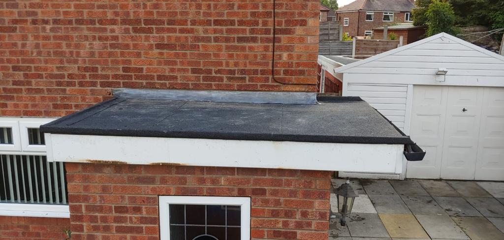 A picture of a flat roof, insulated and felted by Roofers Manchester