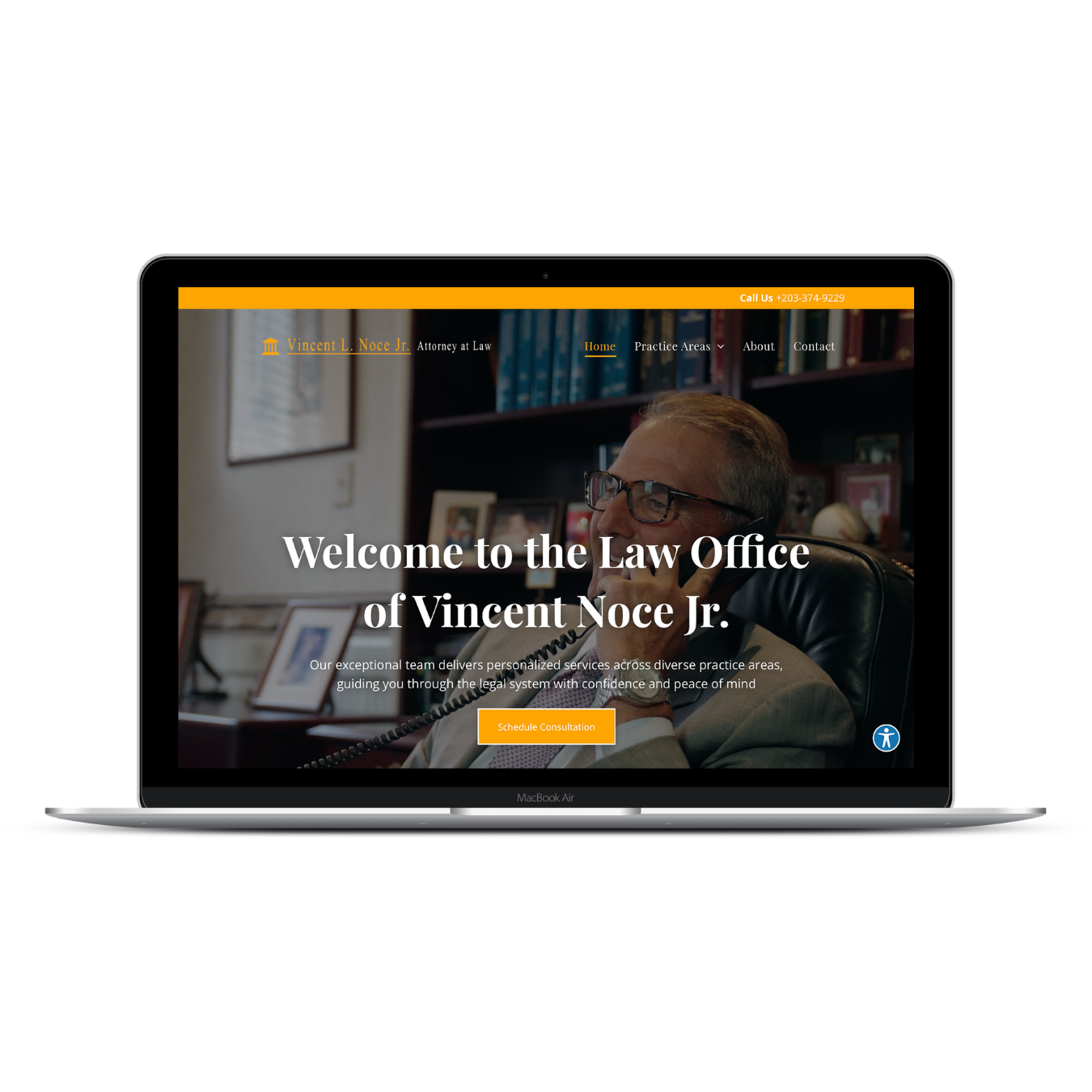 A laptop screen displays the homepage for The Law Office of Vincent Noce Jr., featuring a lawyer in an office setting.