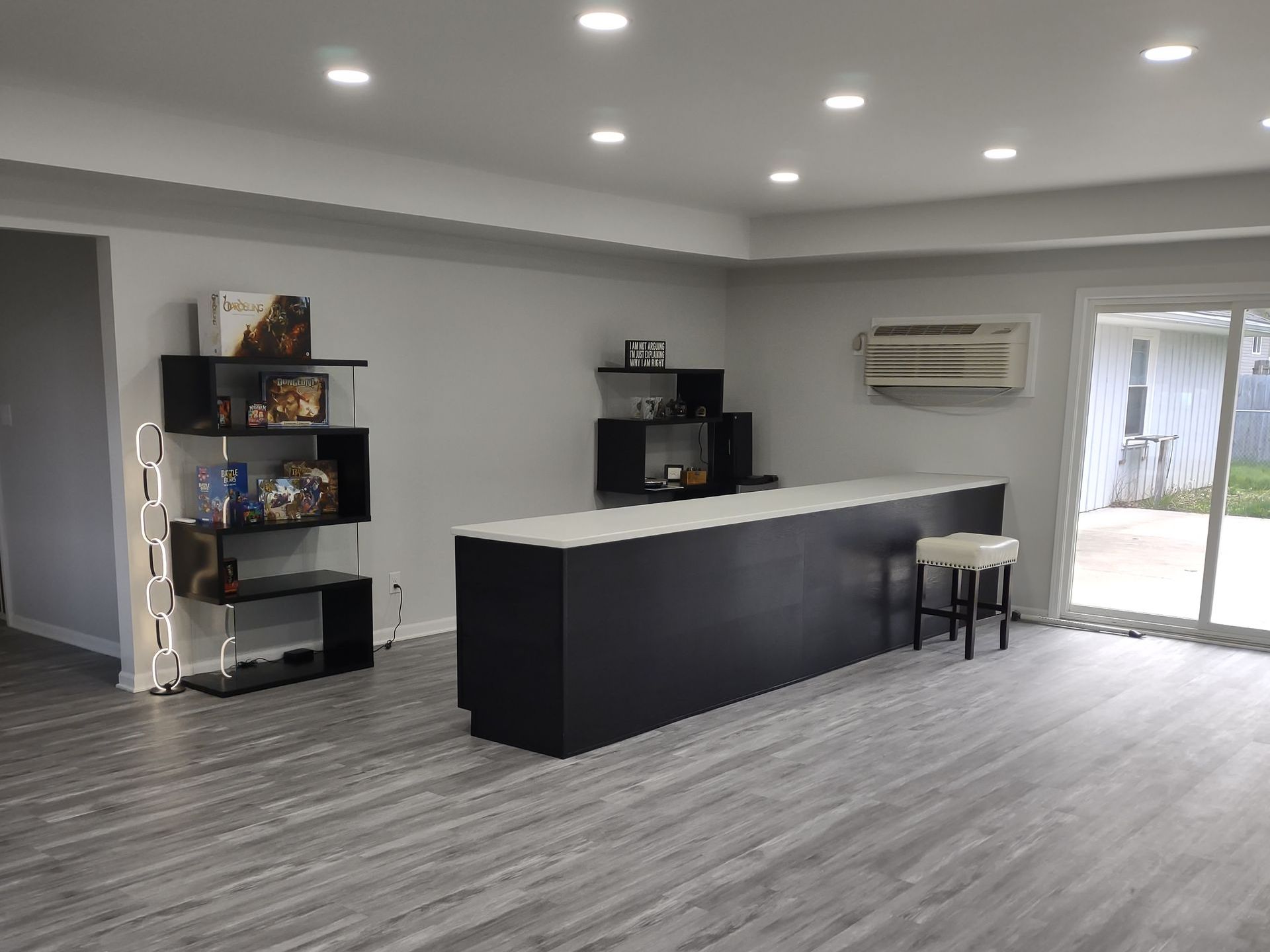 There is a bar in the middle of the room.