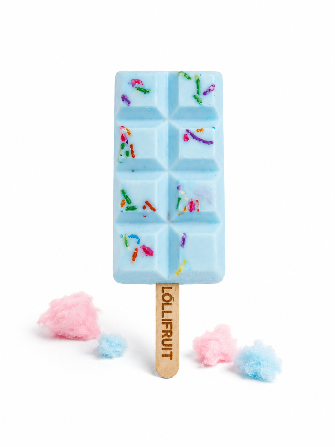 A blue lollipop with sprinkles on it is on a stick.