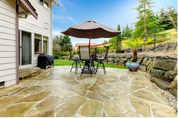 pristine brick home with beautiful residential landscaping out front