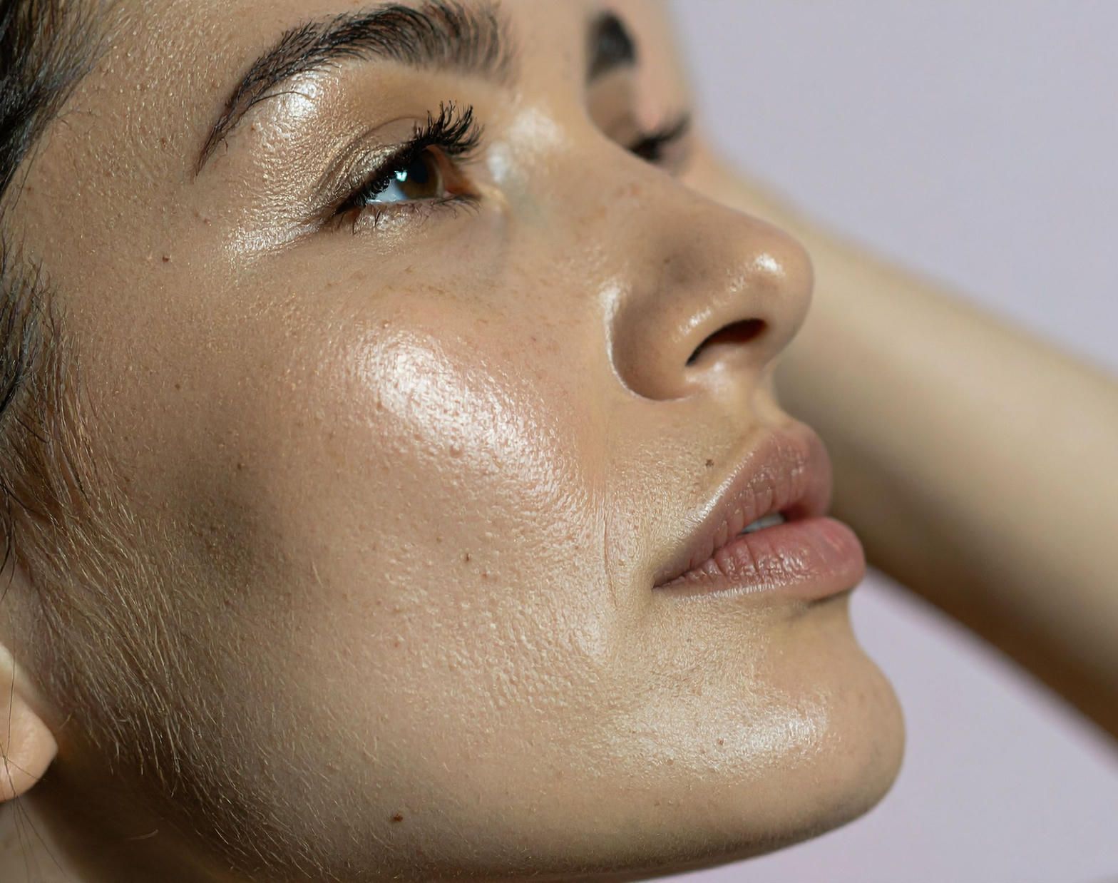Glowing face, neck, and chest after Deluxe Hydrafacial