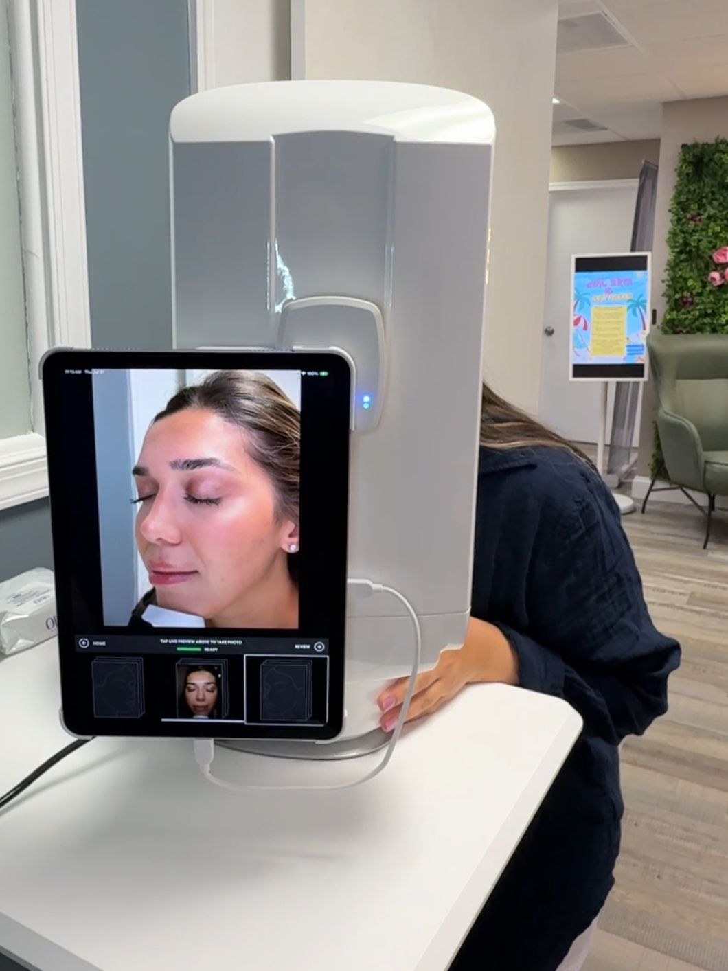 Patient is having NEXA skin analysis scan