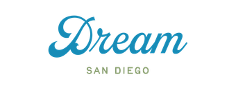 The dream san diego logo is blue and white on a white background.