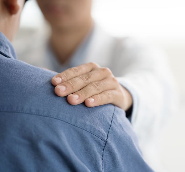 Psychiatrist Hands Encouraging the Patient