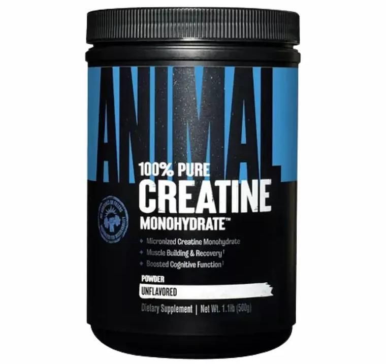 Envase negro de suplemento de monohidrato de creatina con etiqueta azul y tapa negra.